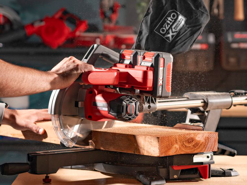 A person is working with a table saw